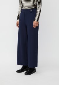 Широкие брюки Широкие брюки