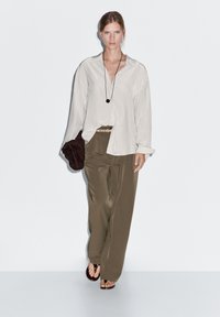 Широкие брюки Широкие брюки