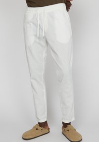 Льняные брюки Льняные брюки