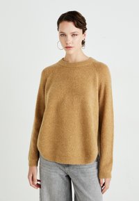 Длинный пуловер Длинный пуловер