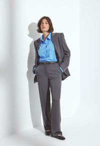 Широкие брюки Широкие брюки