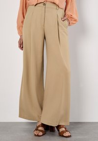 Широкие брюки Широкие брюки