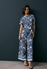 Комбинезон Комбинезон