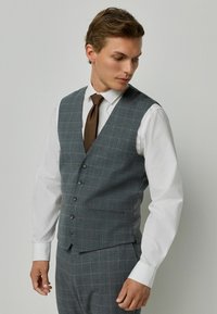 Жилет Жилет