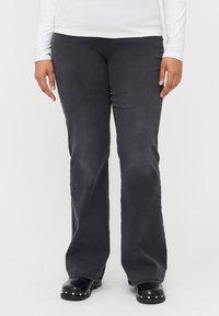 Клешеные джинсы Клешеные джинсы