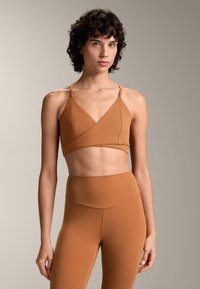 Спортивный бюстгальтер Спортивный бюстгальтер