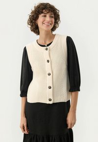 Жилет Жилет