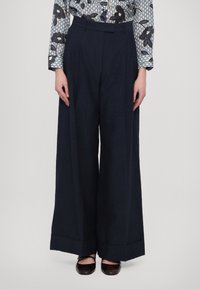 Широкие брюки Широкие брюки