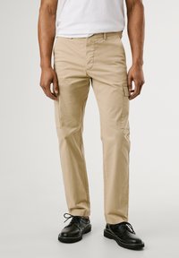 Брюки с накладными карманами Брюки с накладными карманами