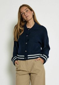 Жилет Жилет