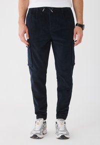 Вельветовые брюки Вельветовые брюки