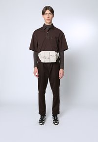 Сумка на пояс Сумка на пояс