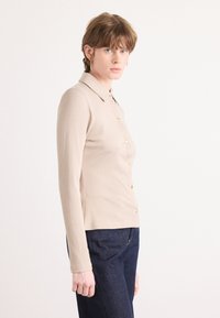 Блузка-рубашка Блузка-рубашка