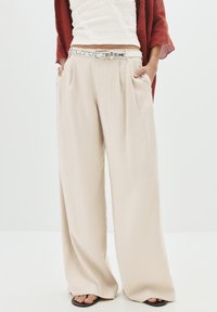 Широкие брюки Широкие брюки