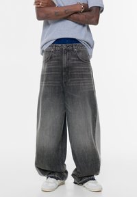 Свободные джинсы Свободные джинсы