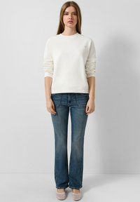 Клешеные брюки Клешеные брюки