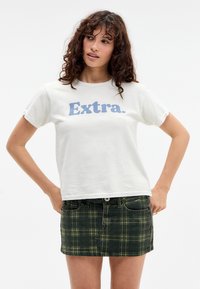 Юбка с накладными карманами Юбка с накладными карманами