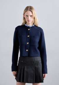 Жилет Жилет