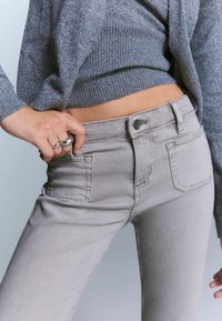 Клешеные брюки Клешеные брюки