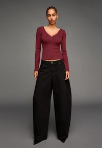 Юбка с накладными карманами Юбка с накладными карманами