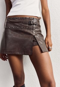 Юбка с накладными карманами Юбка с накладными карманами