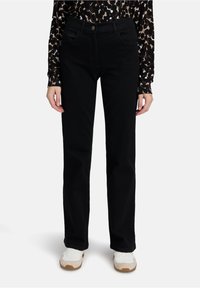 Клешеные джинсы Клешеные джинсы