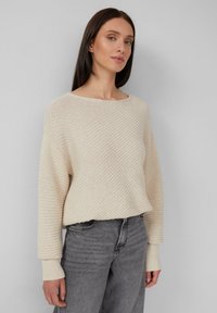 Длинный пуловер Длинный пуловер