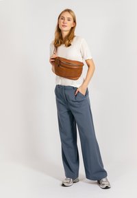 Сумка на пояс Сумка на пояс