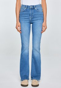 Клешеные брюки Клешеные брюки