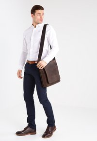 Кожаная сумка Кожаная сумка