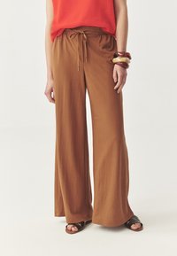 Широкие брюки Широкие брюки