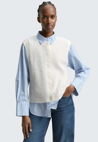 Жилет Жилет