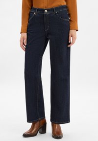 Свободные джинсы Свободные джинсы