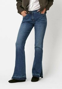 Клешеные брюки Клешеные брюки