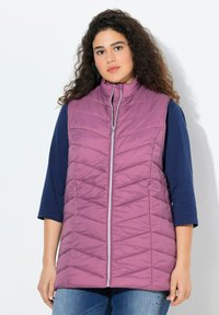 Стеганый жилет Стеганый жилет