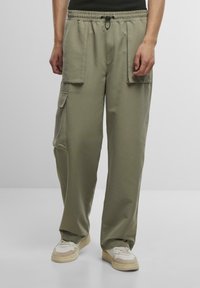 Брюки с накладными карманами Брюки с накладными карманами