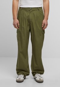 Брюки с накладными карманами Брюки с накладными карманами