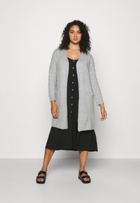 Длинный кардиган Длинный кардиган