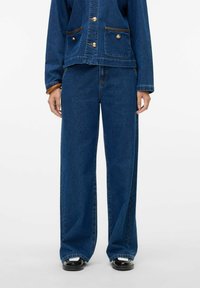 Свободные джинсы Свободные джинсы