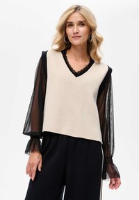 Жилет Жилет