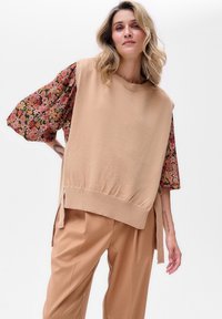 Длинный жилет Длинный жилет