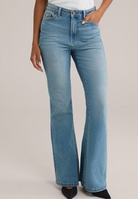 Клешеные брюки Клешеные брюки