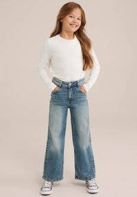 Джинсы Джинсы