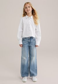 Джинсы Джинсы