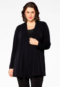 Длинный жилет Длинный жилет