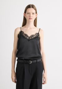 Топ на бретельках Топ на бретельках