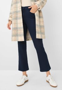 Клешеные брюки Клешеные брюки