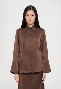 Атласная блузка Атласная блузка