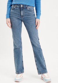 Клешеные брюки Клешеные брюки