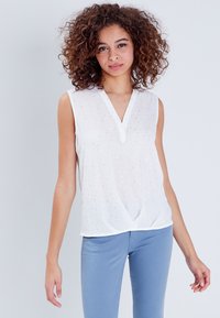 Блузка без рукавов Блузка без рукавов
